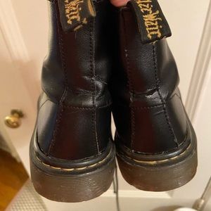 Dr. Martens, black, size 8. Some noteable wear as you can see in pics.
